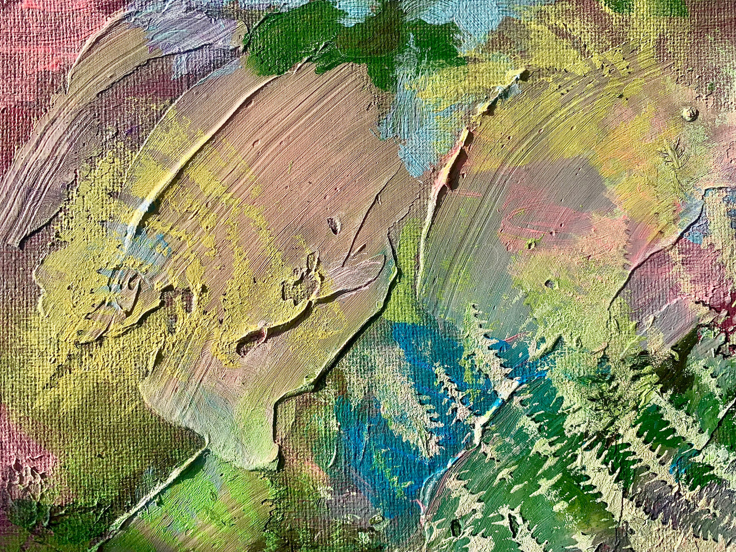 Close-up of textured paint surface with various colors